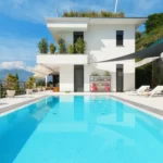 Modern home with a backyard swimming pool
