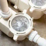 Swimming pool pump and filtration equipment with connected PVC plumbing