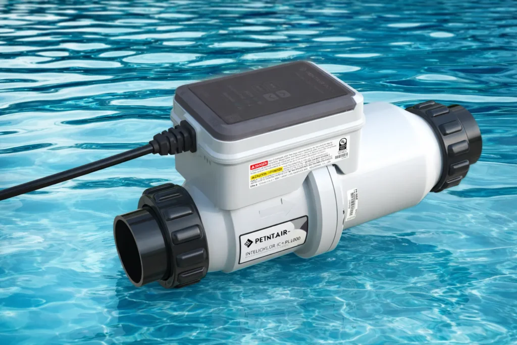 Salt chlorine generator system installed near a swimming pool.